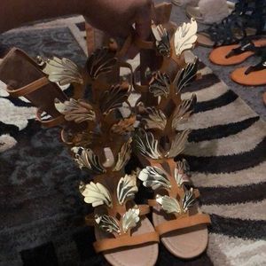 Tall butterfly wing gladiator sandals